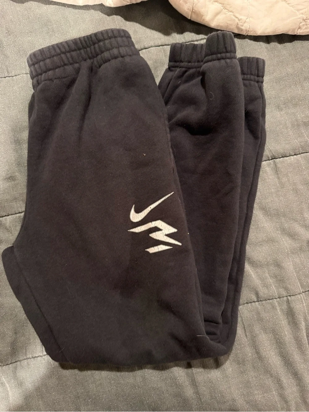 Nike Black Jogger Sweatpants with White Swoosh
